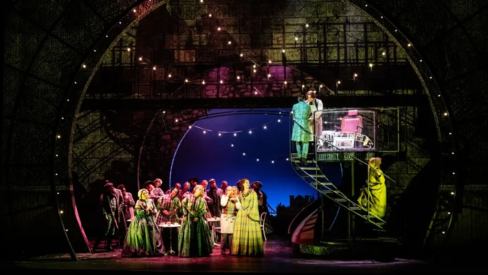 A scene with a staircase to the right leading to a barber's chair on a platform.