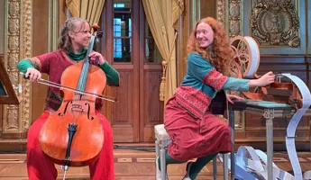 A woman plays the cello, a woman cranks a music box.