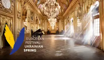 A Ukrainian symbol over a picture of a luxurious salon.