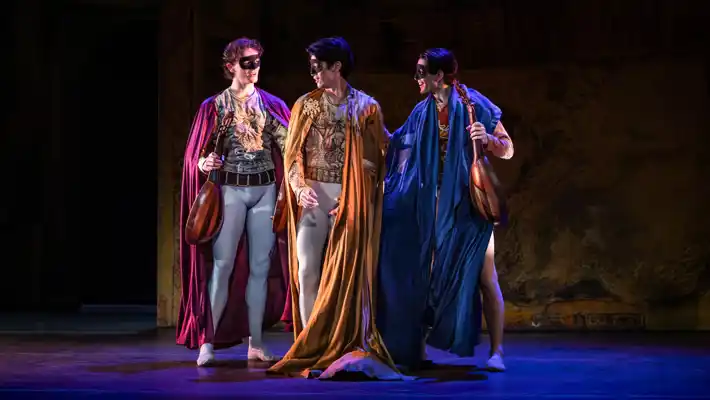 Three men with masks and long cloaks, two holding lutes; they appear to be conversing with each other.