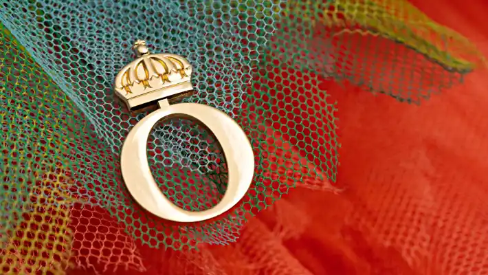 Tulle in different colors with the Royal Swedish Opera emblem in gold.